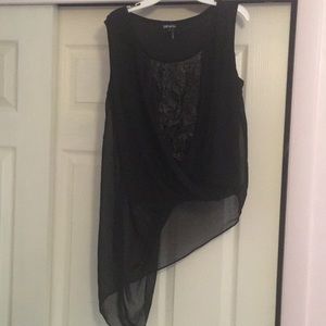 chiffon tank over faux leather textured underlay.